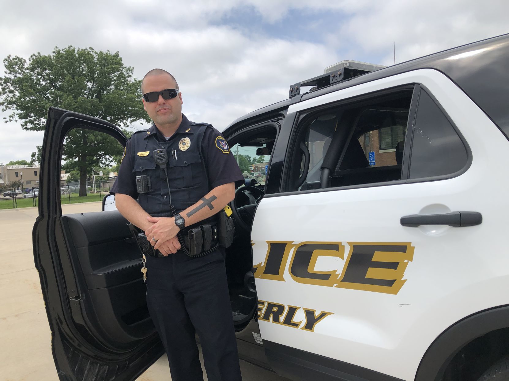 Officer Lindley heads funeral procession of AMVETS Auxiliary president Donna Fischer